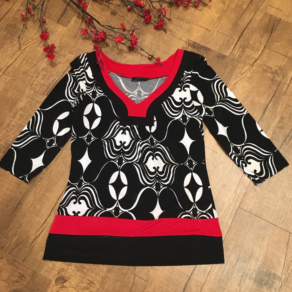 Black and white print top with red trim
